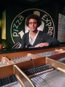 dpa-smk4061-pizza-express Sound engineer Luc Saint Martin with a DPA 4061 mounted inside the piano at the Pizza Express jazz club in London’s Soho
