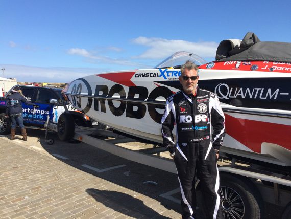 Vin & his boat Quantum preparing for the race – photo by Mick Hannaford