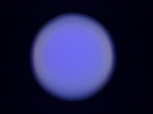 This demonstrates the fringing of white light at the edges of the beam at low saturations.